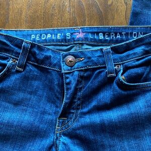 People liberation blue jeans, size 28 made in the USA stars on pockets